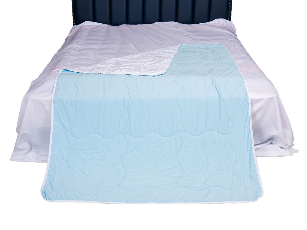 Strikket avkjølende dyne